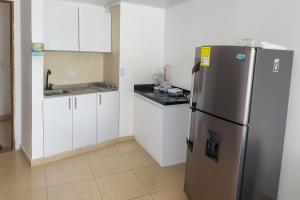 Η κουζίνα ή μικρή κουζίνα στο Azul Caribe Home +5 φωτογραφίες