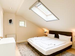 Кровать или кровати в номере Brise Villenensemble Bellevue App 07 +18 фотографий