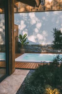 Bazén v ubytování Residence Alpi - Private Spa & Living nebo v jeho okolí