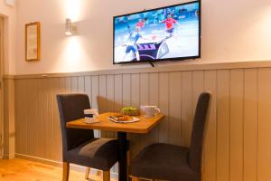 Μια τηλεόραση ή/και κέντρο ψυχαγωγίας στο Irvine Bay +16 φωτογραφίες