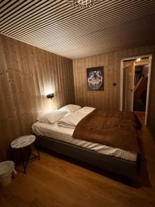 Postel nebo postele na pokoji v ubytování Ustedalen Lodge