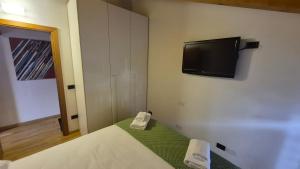 Μια τηλεόραση ή/και κέντρο ψυχαγωγίας στο Attico Centrale ad Auronzo