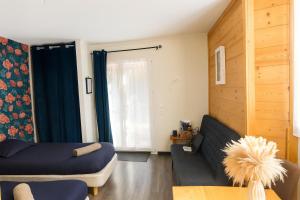 Posezení v ubytování Studio La Cabane Centre Ville