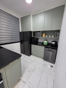 Køkken eller tekøkken på Conforto, Balão & Paraquedas