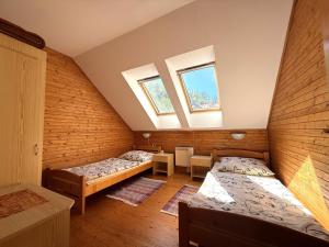 Postel nebo postele na pokoji v ubytování Chata Salvius