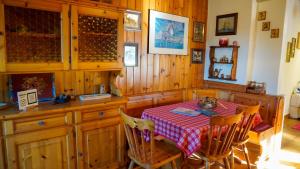 Kuchyň nebo kuchyňský kout v ubytování C'Amunin