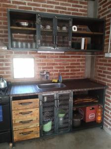 Η κουζίνα ή μικρή κουζίνα στο El Parador