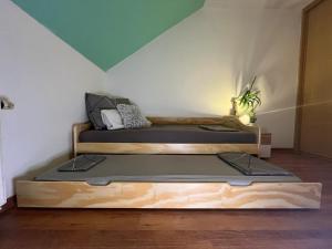 a room with two beds in a room with at Apartment with garage and garden  +15 photos