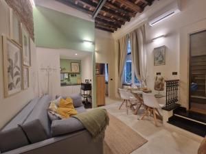 Χώρος καθιστικού στο Erbe12 loft&park historic apartment centro città