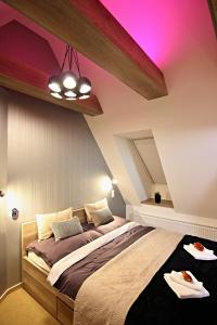 A bed or beds in a room at Apartment Luna