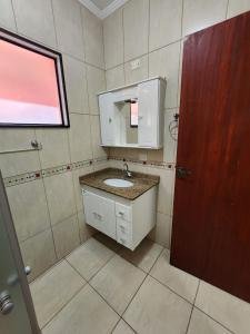 Phòng tắm tại Ap térreo no coração de Boituva