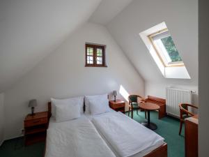 Ένα ή περισσότερα κρεβάτια σε δωμάτιο στο Depandance - vedlejší budova u Zámku Třešť