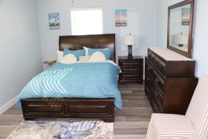 Ένα ή περισσότερα κρεβάτια σε δωμάτιο στο Stella's Beach House