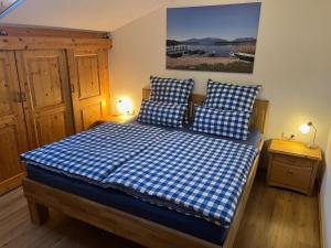 En eller flere senge i et værelse på Ferienwohnung Gruberhof