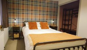 Ένα ή περισσότερα κρεβάτια σε δωμάτιο στο The Hirsel on Skye +5 φωτογραφίες