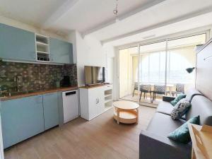 Η κουζίνα ή μικρή κουζίνα στο Les Terrasses du PortVUE PortClimWifiParking