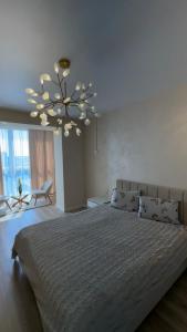 Ένα ή περισσότερα κρεβάτια σε δωμάτιο στο Great House АВТОвокзал