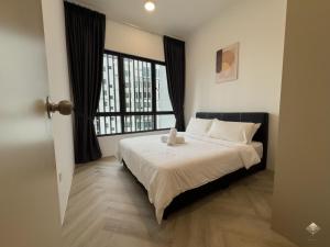 Ένα ή περισσότερα κρεβάτια σε δωμάτιο στο Rumaho Upton by Elica Kuching +129 φωτογραφίες