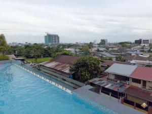 Πισίνα στο ή κοντά στο Rumaho Upton by Elica Kuching
