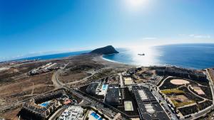 an aerial view of a city next to the ocean at La Tejita "Vida" by BE HAPPY in La Tejita