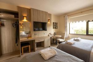 Un pat sau paturi într-o cameră la Station House Bed & Breakfast