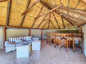 a living room with a couch and a table at 70 on Brander in Cape Town