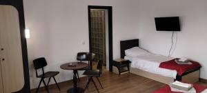 Postel nebo postele na pokoji v ubytování Pensiunea Bălcești Beliș Apuseni