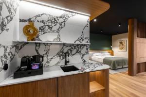 Postel nebo postele na pokoji v ubytování Hotel Kraft