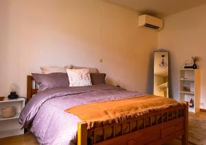 Postel nebo postele na pokoji v ubytování La Vallée d Anna