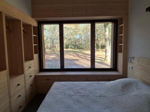 Ένα ή περισσότερα κρεβάτια σε δωμάτιο στο Saint Michel Escalus