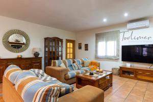 TV a/nebo společenská místnost v ubytování Todimer villa refugio