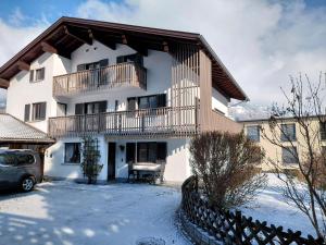 a large white building with a balcony on it at Ferienhaus Gioia in Schruns-Tschagguns