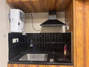 Η κουζίνα ή μικρή κουζίνα στο Nova Regency