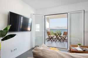 Μια τηλεόραση ή/και κέντρο ψυχαγωγίας στο S'Embat sea views