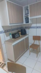 Η κουζίνα ή μικρή κουζίνα στο Sossego1