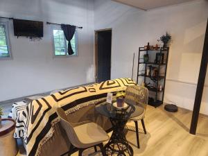 Χώρος καθιστικού στο Cozy Guesthouse with Bathtub in Alto Boquete +4 φωτογραφίες