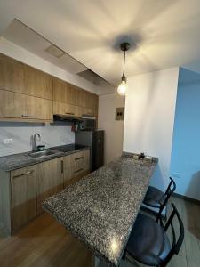 Køkken eller tekøkken på Modern and Central Suite in Ibarra