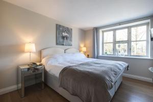 Ένα ή περισσότερα κρεβάτια σε δωμάτιο στο Warbler Lodge