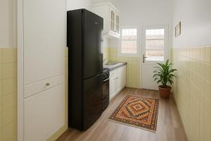 Η κουζίνα ή μικρή κουζίνα στο Rabat Central Executive Suite Apartment +9 φωτογραφίες