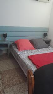 Una cama o camas en una habitación de Gîte LE Rebattu