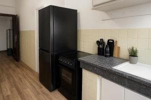 Η κουζίνα ή μικρή κουζίνα στο Rabat Central Executive Suite Apartment