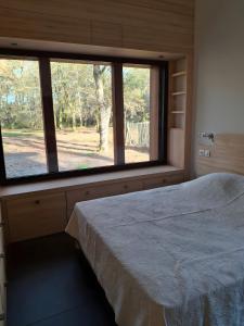 Ένα ή περισσότερα κρεβάτια σε δωμάτιο στο Saint Michel Escalus