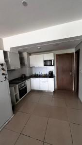 Η κουζίνα ή μικρή κουζίνα στο Dpto de dos habitaciones San Lorenzo centro