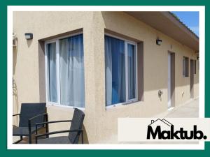 En balkon eller terrasse på Maktub Alojamiento