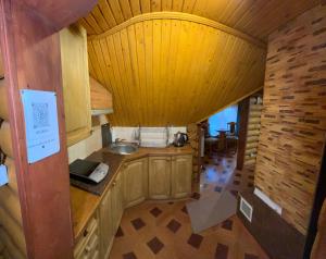 an overhead view of a kitchen in a tiny house at Pid skeleju in Rakhiv