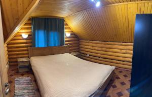 Ένα ή περισσότερα κρεβάτια σε δωμάτιο στο Pid skeleju