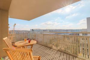 En balkon eller terrasse på Charmant et Spacieux proche Groupama Stadium