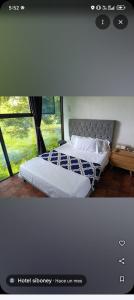 Ένα ή περισσότερα κρεβάτια σε δωμάτιο στο Siboney family