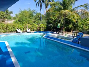 Swimmingpoolen hos eller tæt på Siboney family