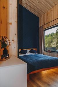 Postel nebo postele na pokoji v ubytování Chill&Heal, Либохора - будинки в горах, відпочинок в Карпатах, чан